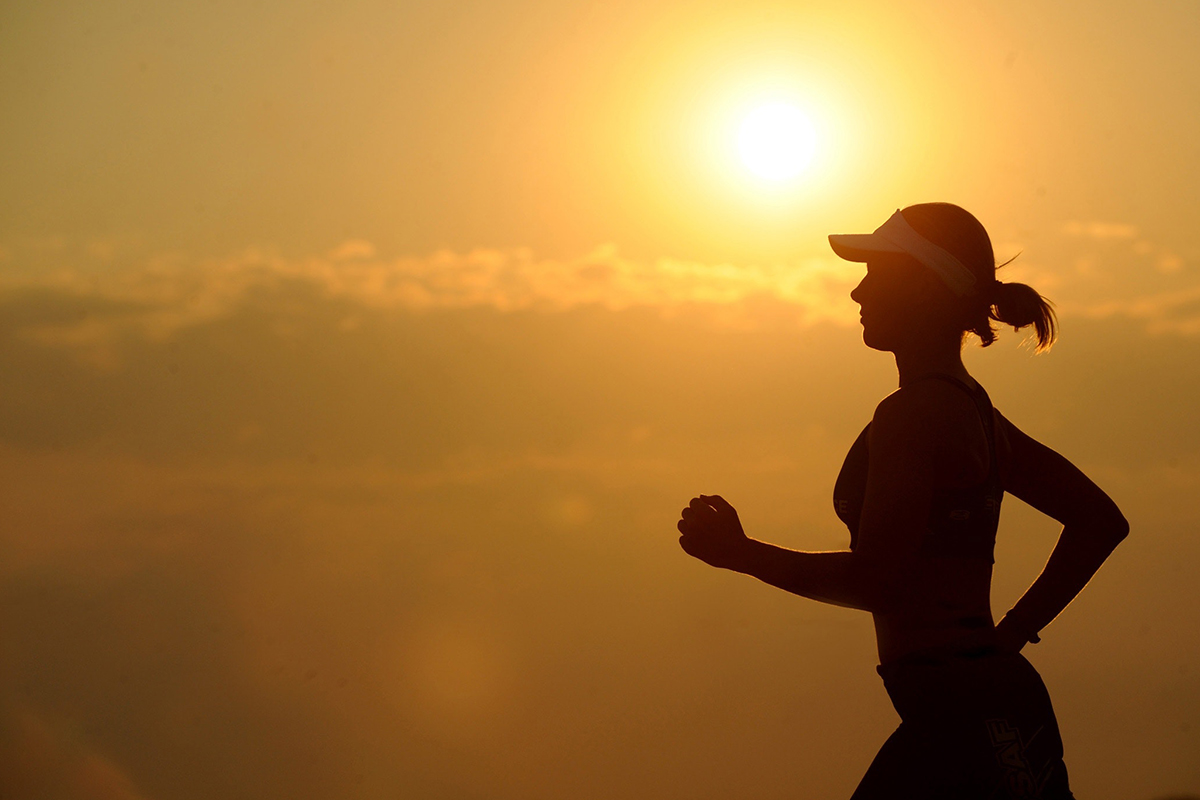 a lady running showing how to develop a strong mental game